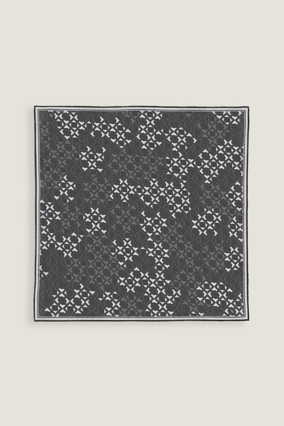 Double-faced silk scarf 70 with geometric surface pattern in warm gray tones by MÀNA