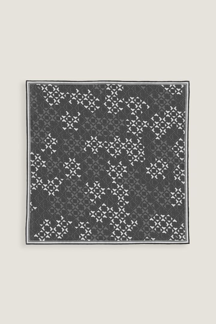 Double-faced silk scarf 70 with geometric surface pattern in warm gray tones by MÀNA
