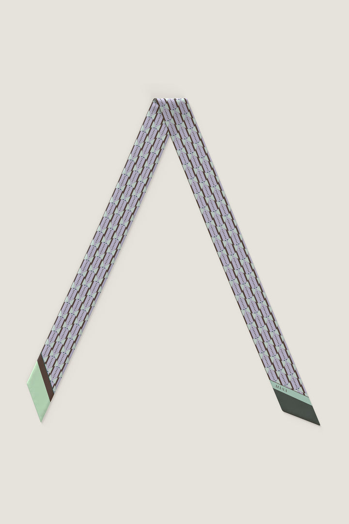 Double-sided luxury silk twill scarf featuring architectural line design by MÀNA Amsterdam