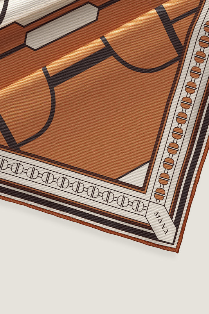 Luxury hand designed silk scarf with timeless pattern in earth tones by MÀNA